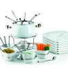 Fondueset 1 x Fonduetopf, 1 x Spritzschutz, 1 x Rechaud mit Drehkarusell, 1 x Brenner, 6 x Fonduegabeln, 6 x Fonduelöffel, 6 x Schälchen, 6 x Fondueteller