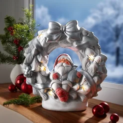 LED-Keramikfigur „Santa im Kranz“